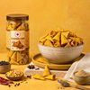 Polka Chatpata Cone Namkeen jar with crunchy cone-shaped snacks in a bowl and spices